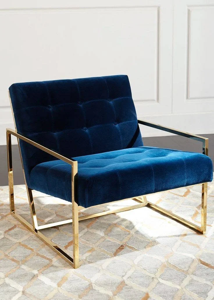 Navy velvet chair on a gold frame