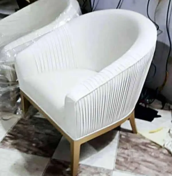 White channel back armchair