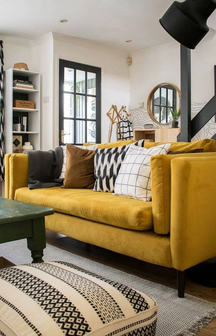 Mustard velvet sofa in a loft